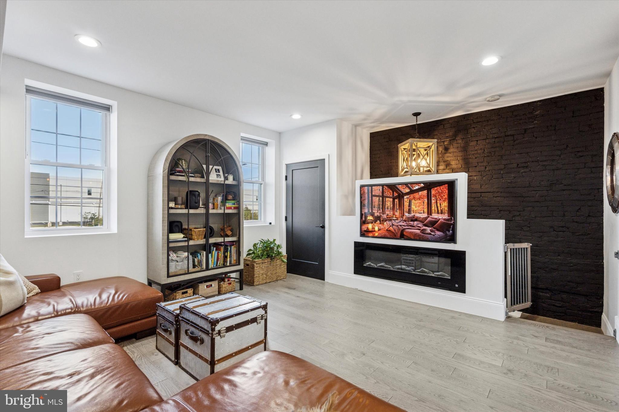 2694 Bridge Street Philadelphia, PA 19137 - Photo 11 of 41 a living room with furniture and a flat screen tv