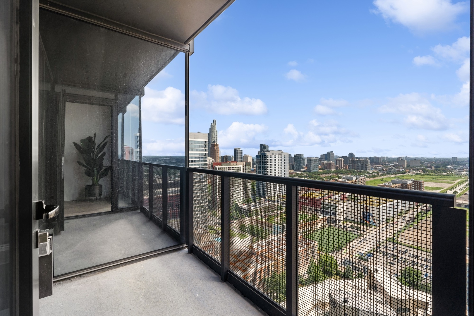 234 West Polk Street, Unit 2905 Chicago, IL 60607 - Photo 17 of 36 a view of a balcony with city