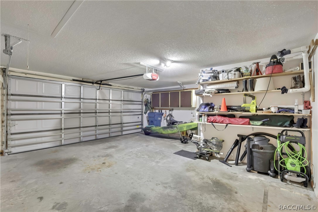 2 Quail Run Homosassa, FL 34446 - Photo 31 of 36 Garage has plenty of storage