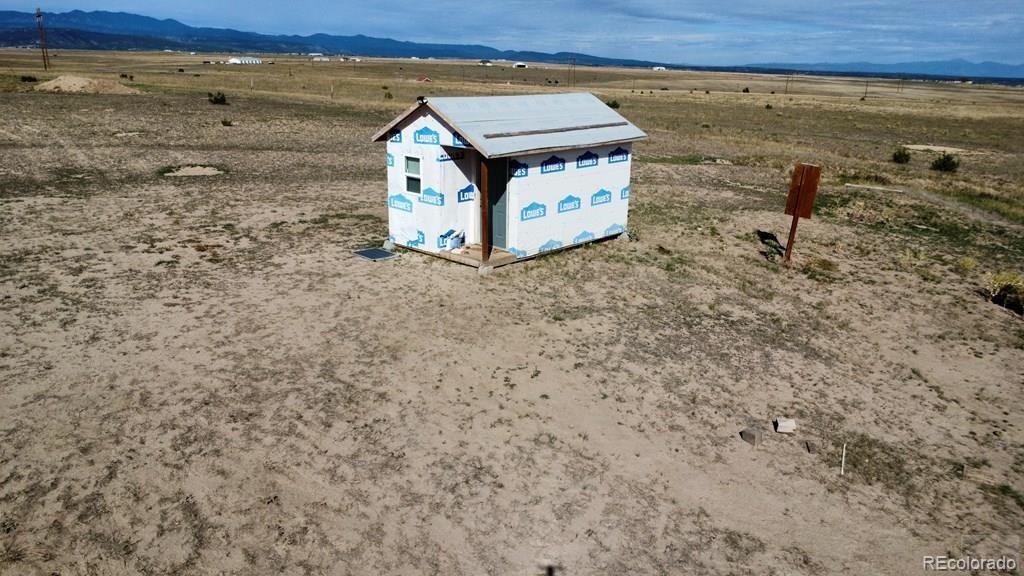 6567 Mdw Blf Drive Rye, CO 81069 - Photo 13 of 21 a view of a dry yard with wooden fence