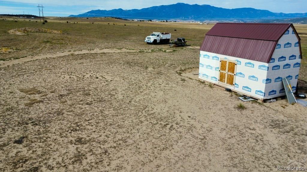 6567 Mdw Blf Drive Rye, CO 81069 - Photo 2 of 21 a view of a room with wooden floor and lake view