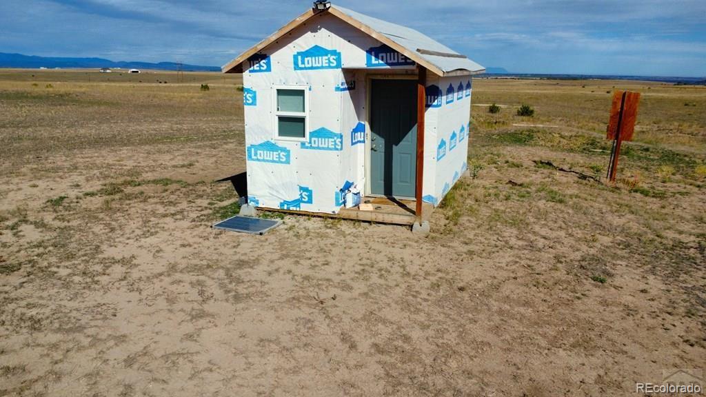 6567 Mdw Blf Drive Rye, CO 81069 - Photo 8 of 21 a front view of a house with a yard