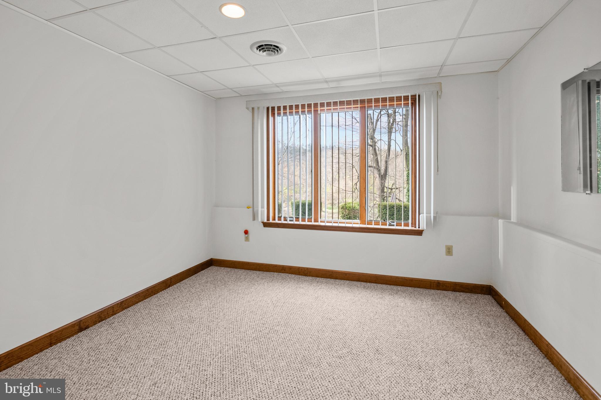 1101 Riverview Drive Reading, PA 19605 - Photo 35 of 67 an empty room with windows