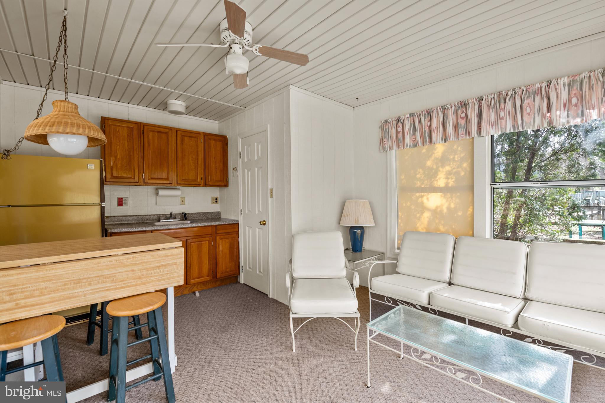 1101 Riverview Drive Reading, PA 19605 - Photo 62 of 67 a living room with furniture a flat screen tv and a large window