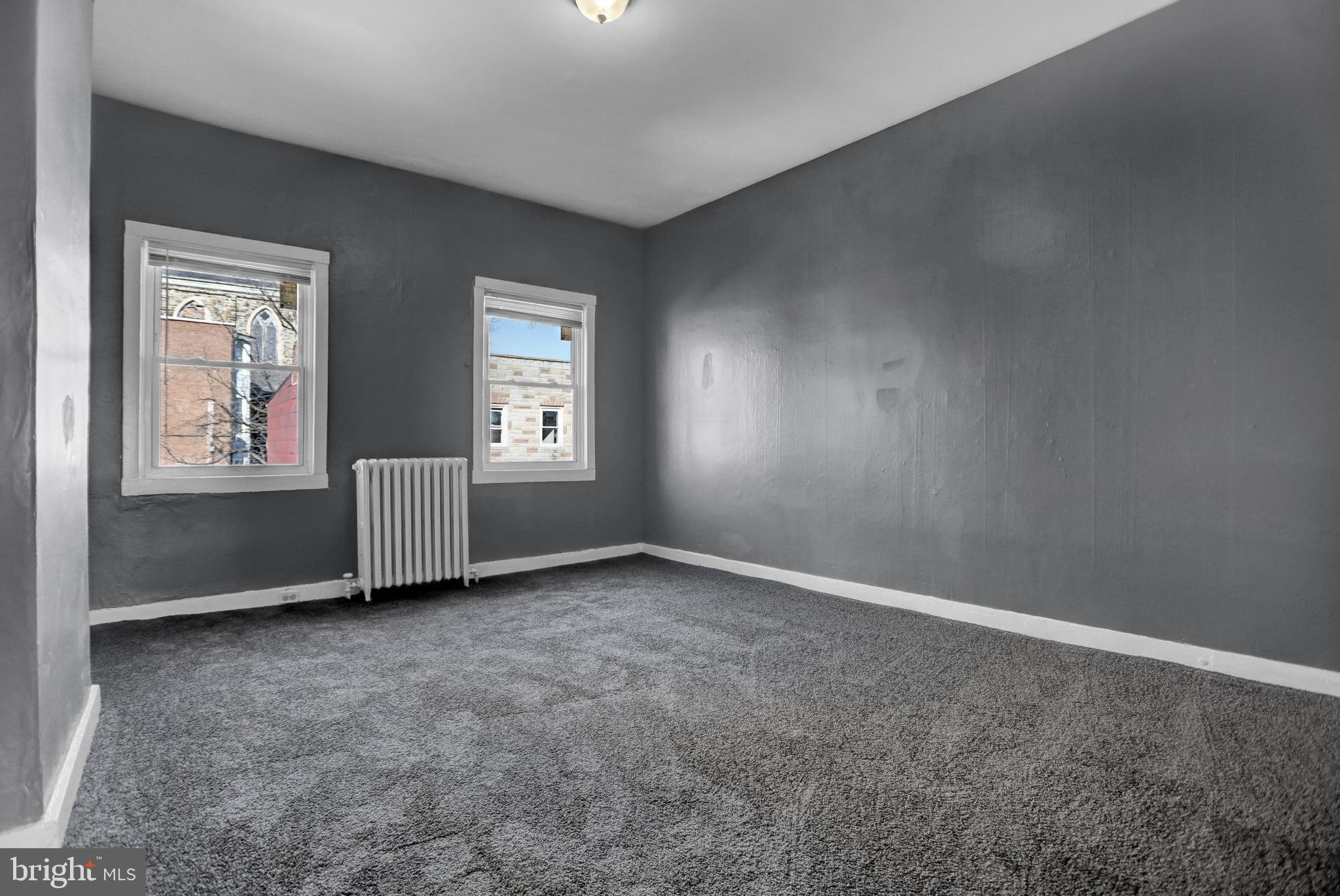 957 Bennett Place Baltimore, MD 21223 - Photo 19 of 30 an empty room with windows