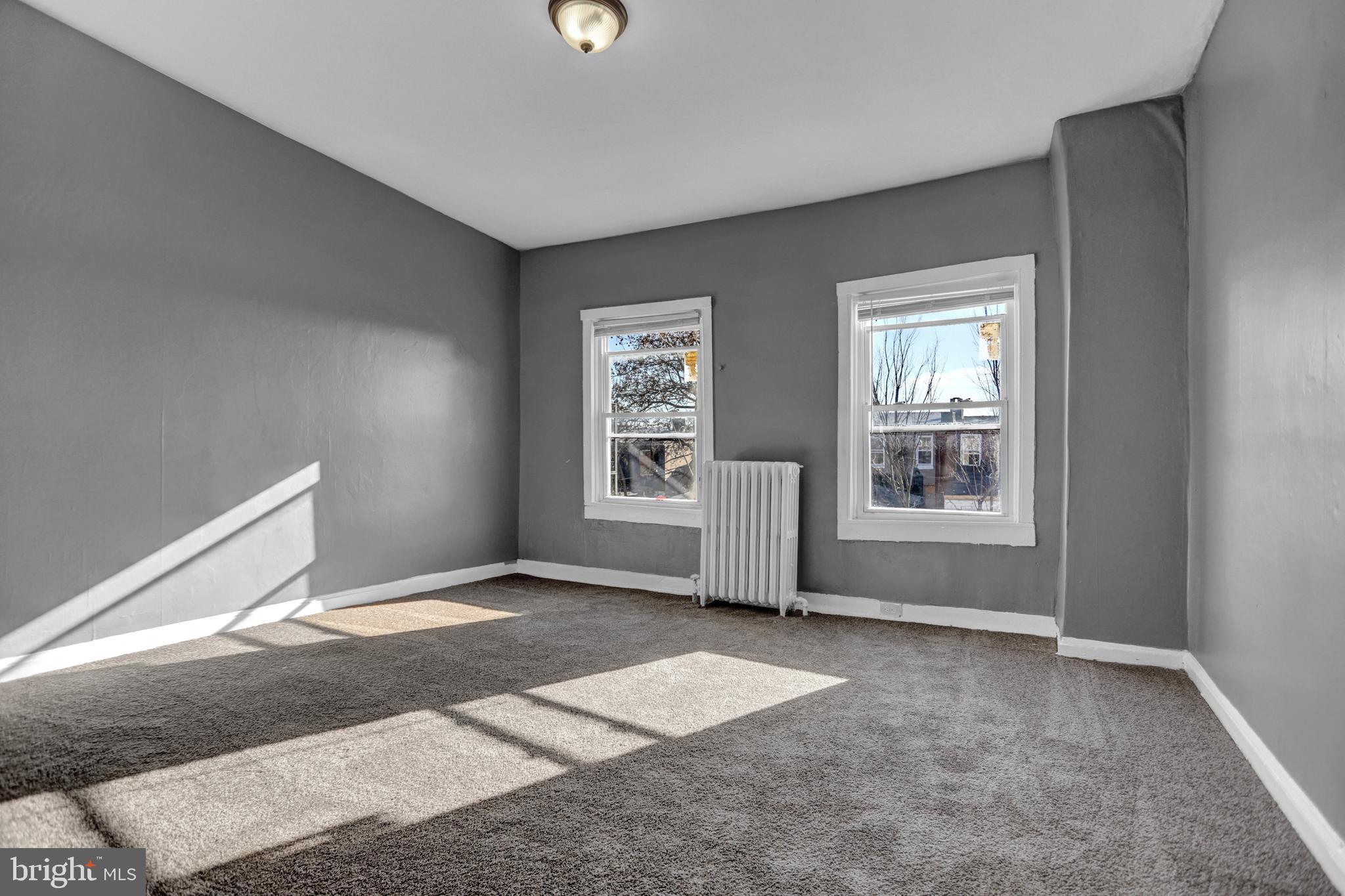 957 Bennett Place Baltimore, MD 21223 - Photo 20 of 30 a view of an empty room with a window