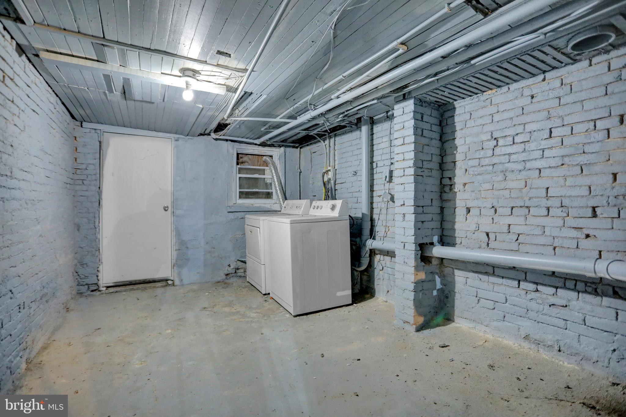 957 Bennett Place Baltimore, MD 21223 - Photo 25 of 30 a view of a storage & utility room with a sink