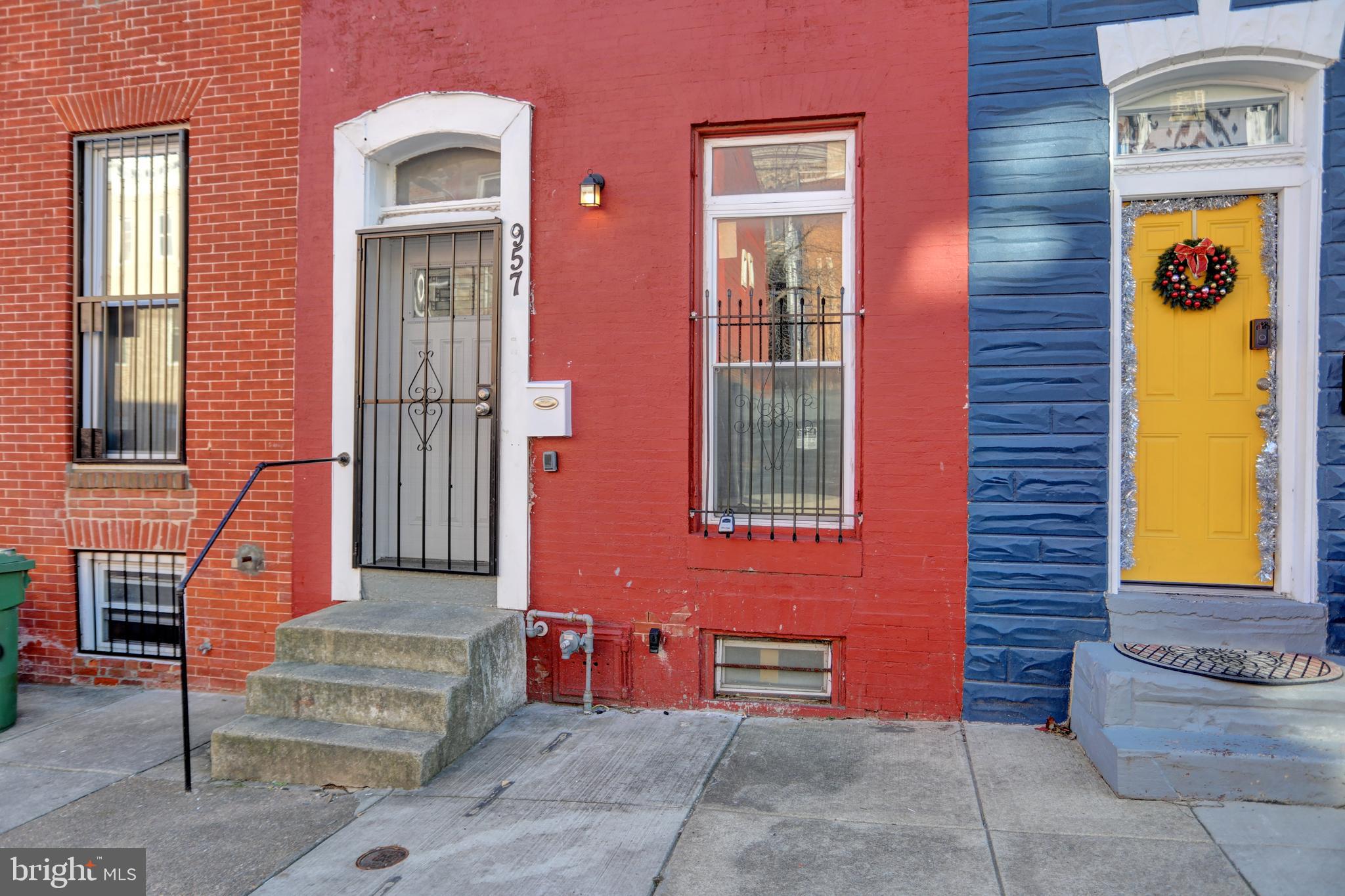 957 Bennett Place Baltimore, MD 21223 - Photo 30 of 30 a front view of a house with outdoor seating