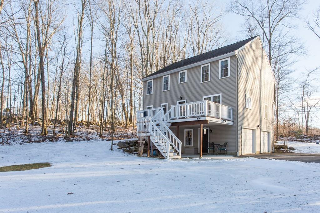 75 Ragged Hill Road West Brookfield, MA 01585 - Photo 33 of 38 a view of a house with a patio