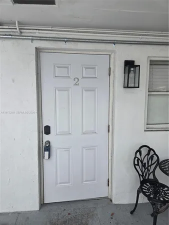 a view of a hallway that has closet
