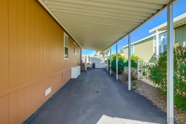 a view of a porch with furniture