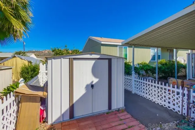 a view of balcony with furniture