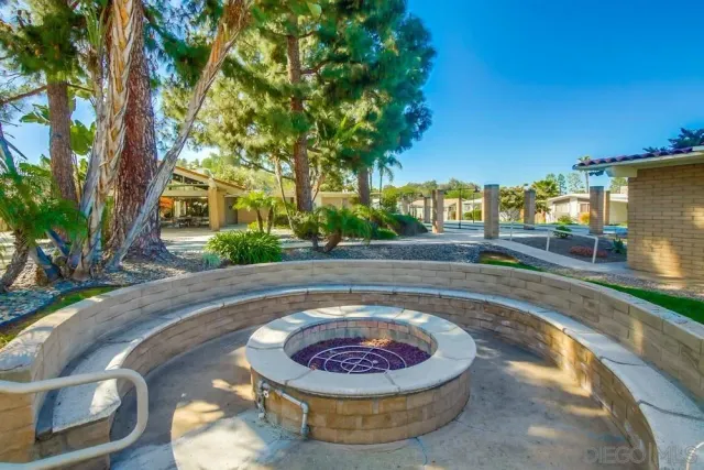 a view of a swimming pool with a patio