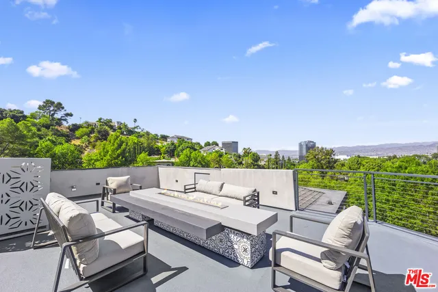 a view of a terrace with chairs