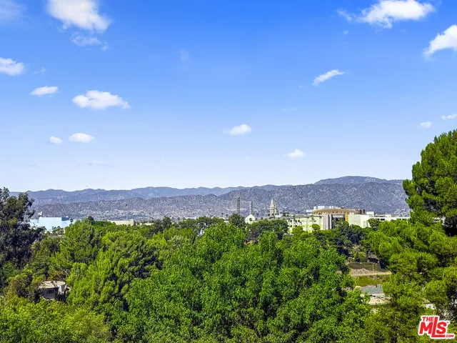 a view of a couches in backyard of the house