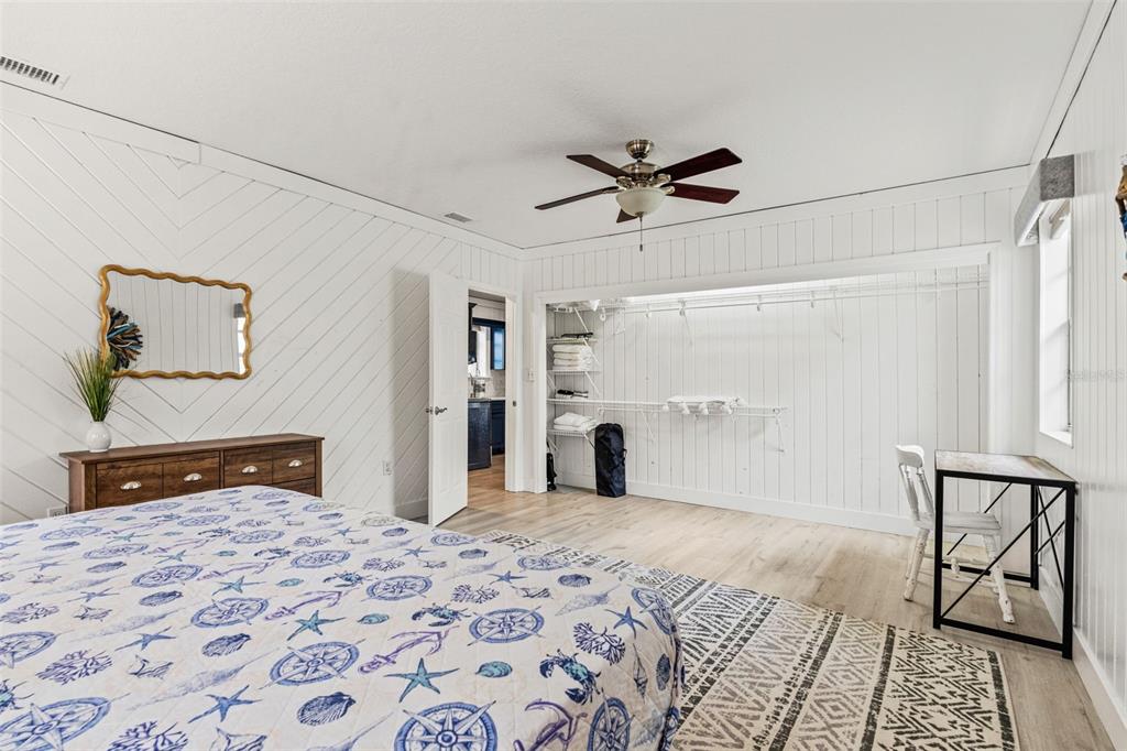 5430 Circle Drive Weeki Wachee, FL 34607 - Photo 12 of 31 a bedroom with a bed and a dresser