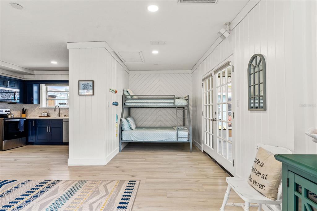 5430 Circle Drive Weeki Wachee, FL 34607 - Photo 13 of 31 a view of entryway with stairs and wooden floor