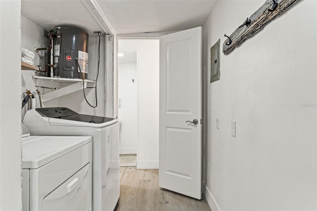 5430 Circle Drive Weeki Wachee, FL 34607 - Photo 23 of 31 a view of a storage and utility room in a house