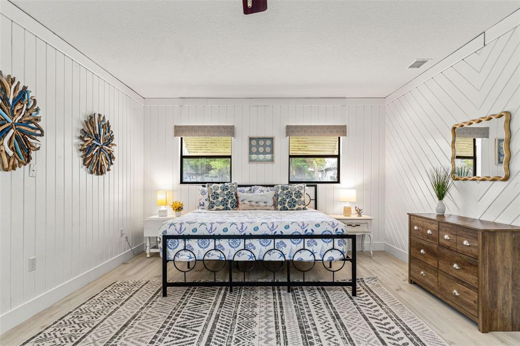 5430 Circle Drive Weeki Wachee, FL 34607 - Photo 10 of 31 a bedroom with a bed and a dresser