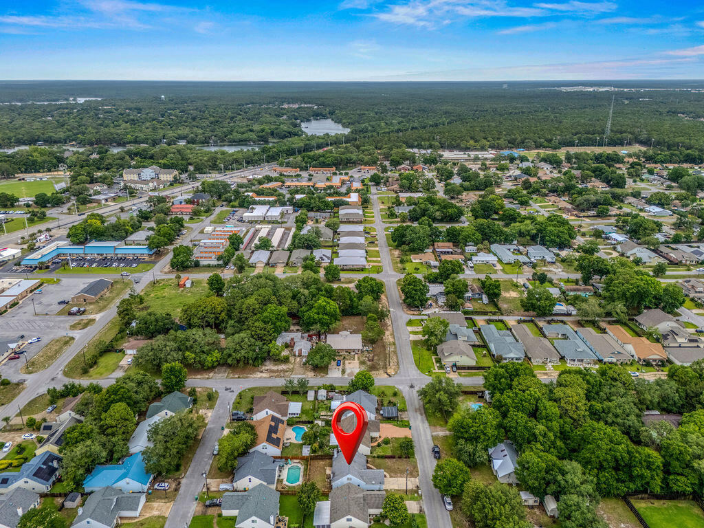 53 4th Street Shalimar, FL 32579 - Photo 43 of 47 an aerial view of residential building and parking space