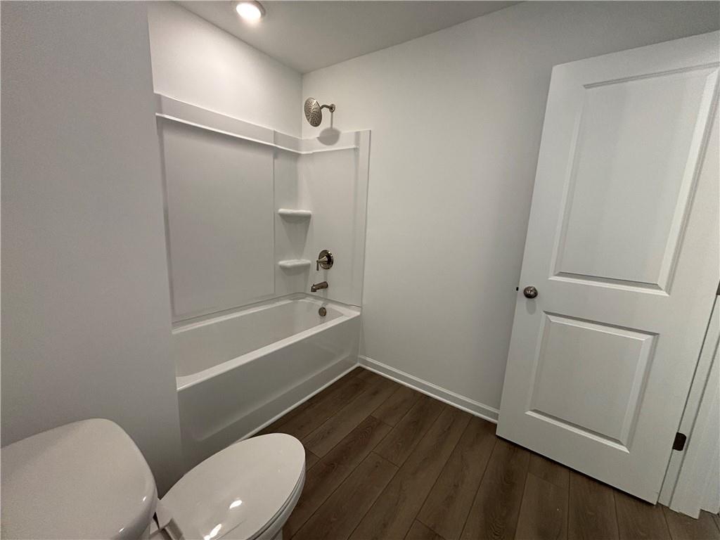 6125 Kismet Road Buford, GA 30518 - Photo 28 of 40 a bathroom with a sink and a mirror