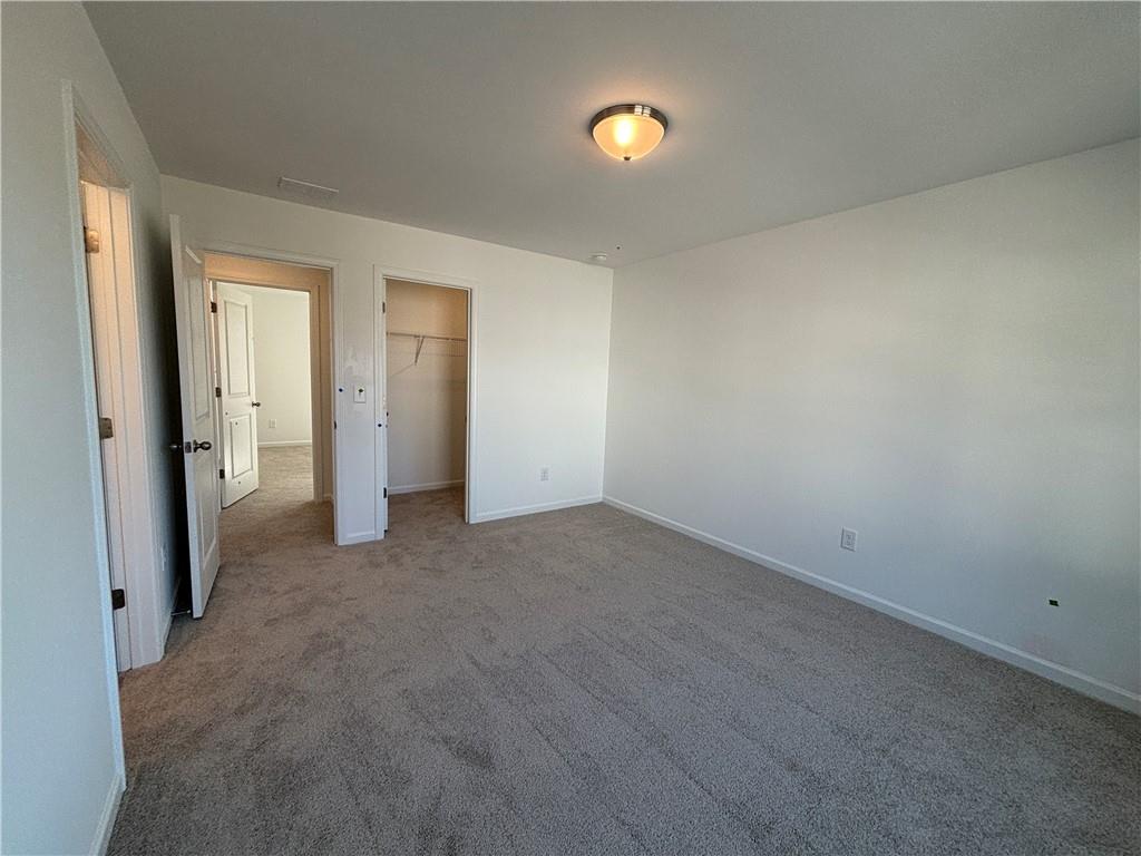 6125 Kismet Road Buford, GA 30518 - Photo 32 of 40 a view of an empty room and a window