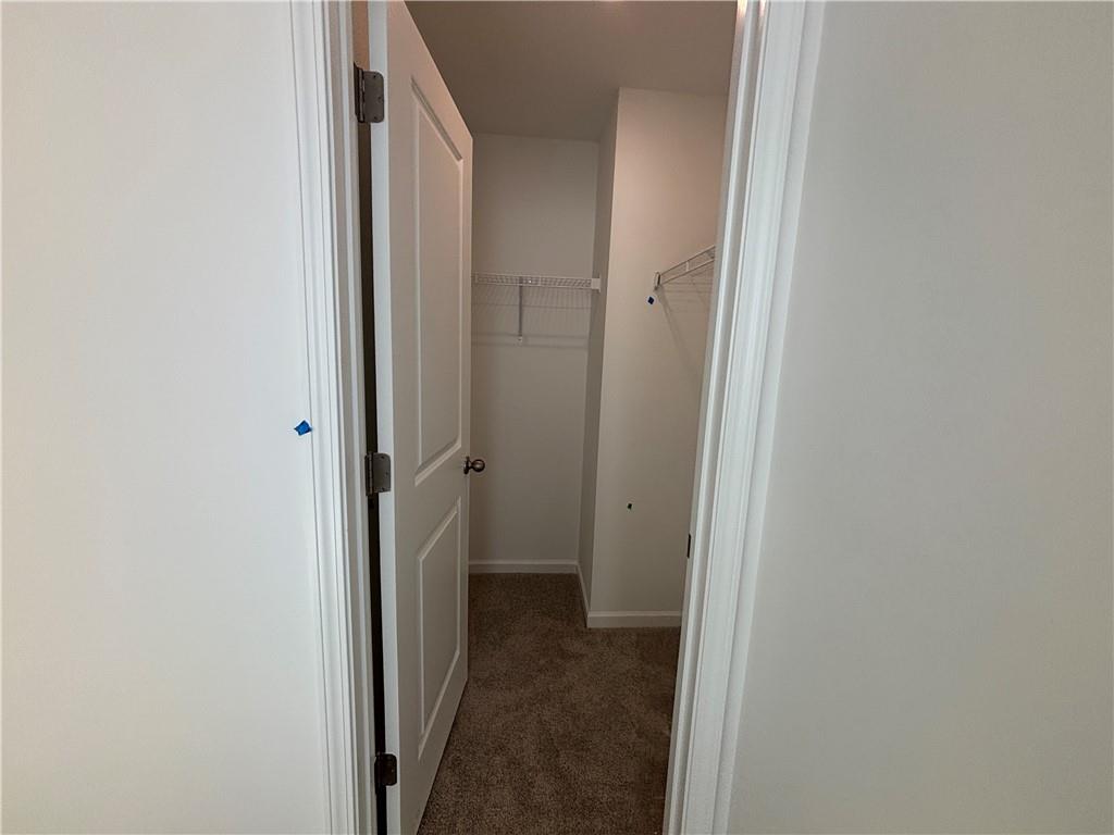 6125 Kismet Road Buford, GA 30518 - Photo 36 of 40 a view of a bathroom from the hallway