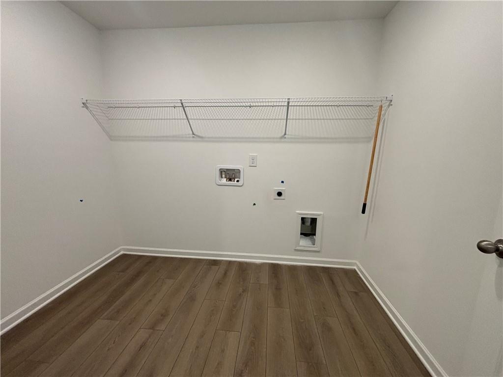 6125 Kismet Road Buford, GA 30518 - Photo 37 of 40 a view of a room with wooden floor