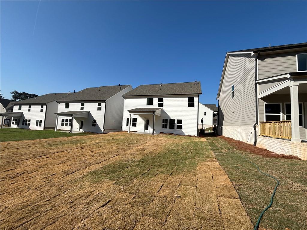 6125 Kismet Road Buford, GA 30518 - Photo 39 of 40 a big room with closet and windows