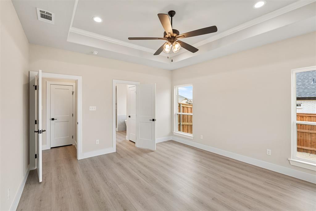506 Limestone Circle Mabank, TX 75147 - Photo 13 of 33 wooden floor in an empty room with a window