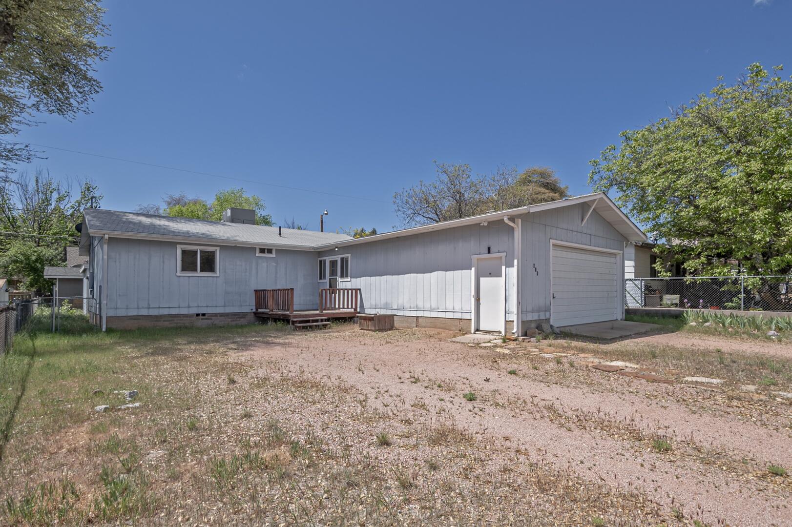 411 West Bridle Path Lane Payson, AZ 85541 - Photo 2 of 21 a view of a house with a backyard
