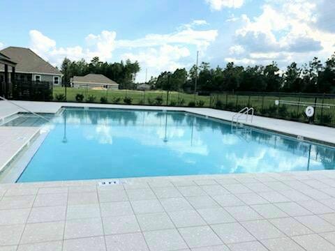 704 Quintana Street Crestview, FL 32539 - Photo 30 of 32 swimming pool view with a outdoor space