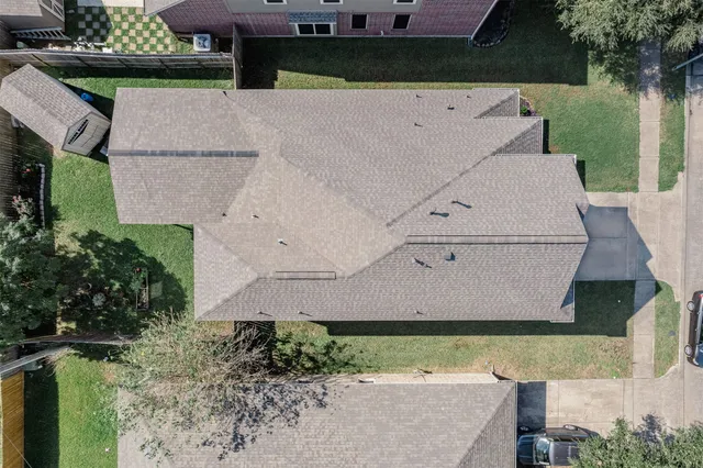 a view of a patio with table and chairs potted plants with wooden fence