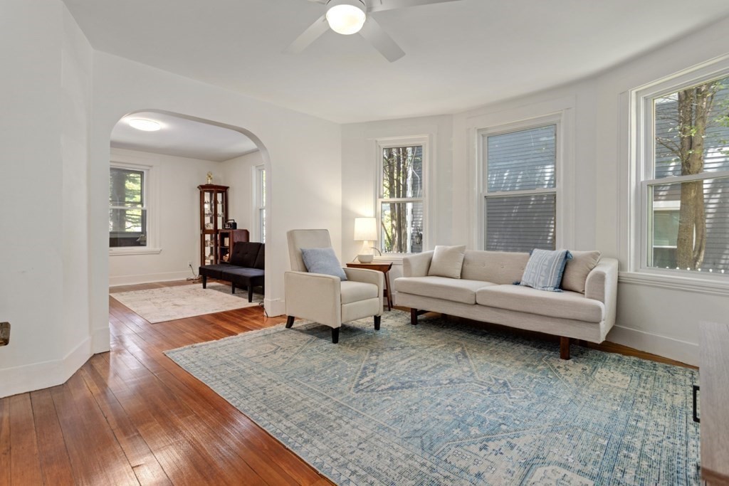 a living room with furniture and a couch