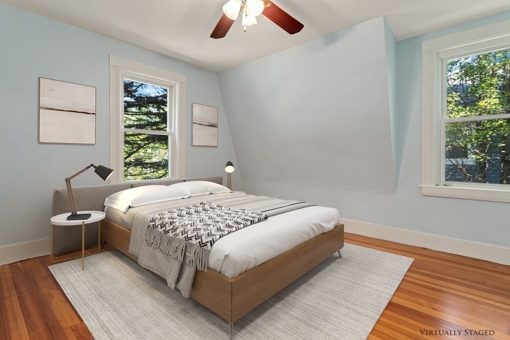 34 Eustis Street Saugus, MA 01906 - Photo 13 of 28 a bedroom with a bed and window