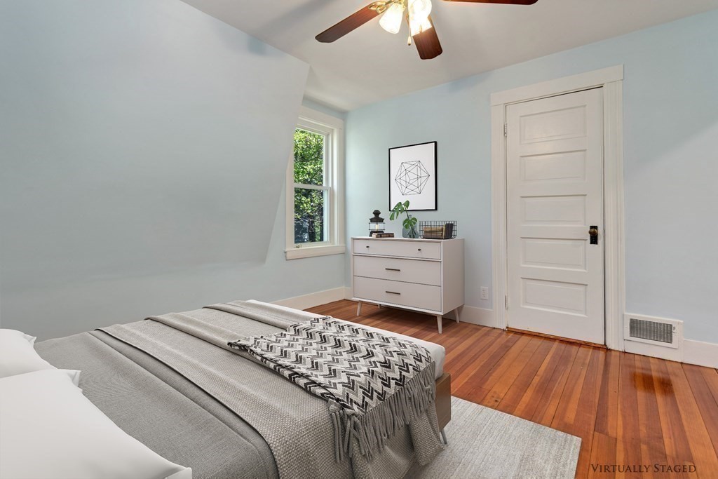 34 Eustis Street Saugus, MA 01906 - Photo 16 of 28 a bedroom with a bed and a dresser