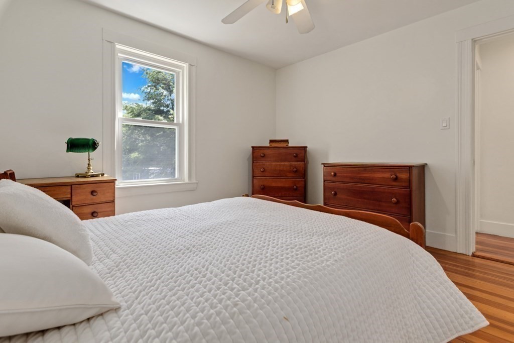34 Eustis Street Saugus, MA 01906 - Photo 22 of 28 a bedroom with a bed and a window
