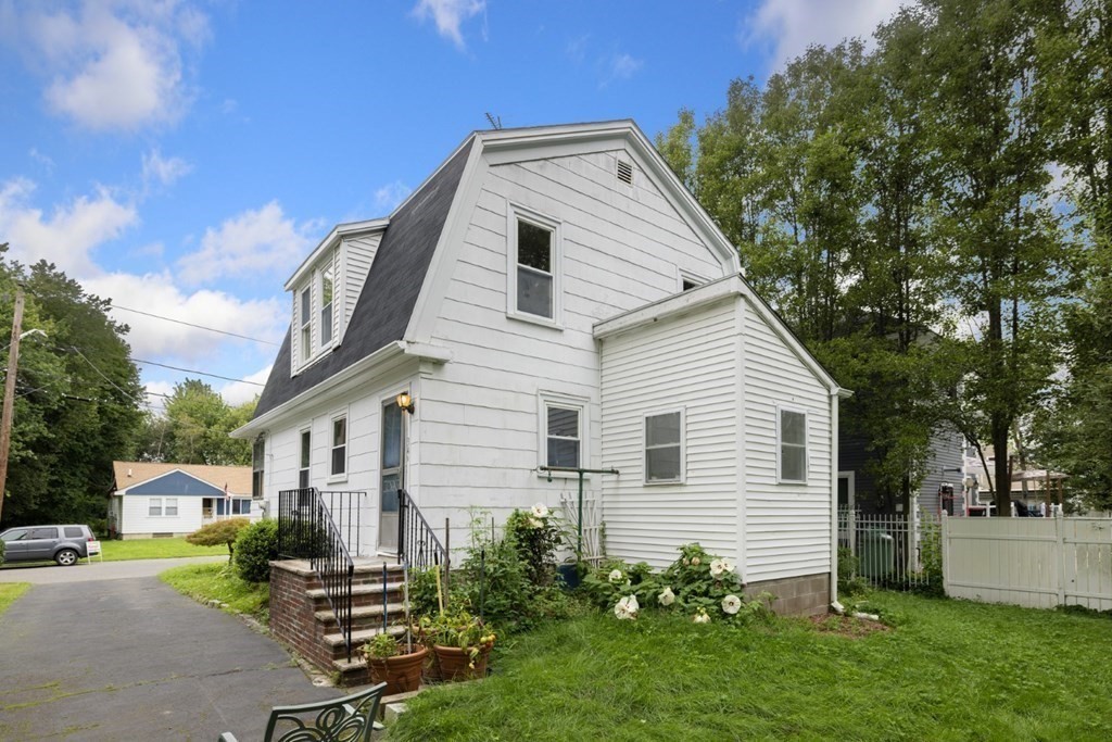 34 Eustis Street Saugus, MA 01906 - Photo 28 of 28 a view of a house with a yard