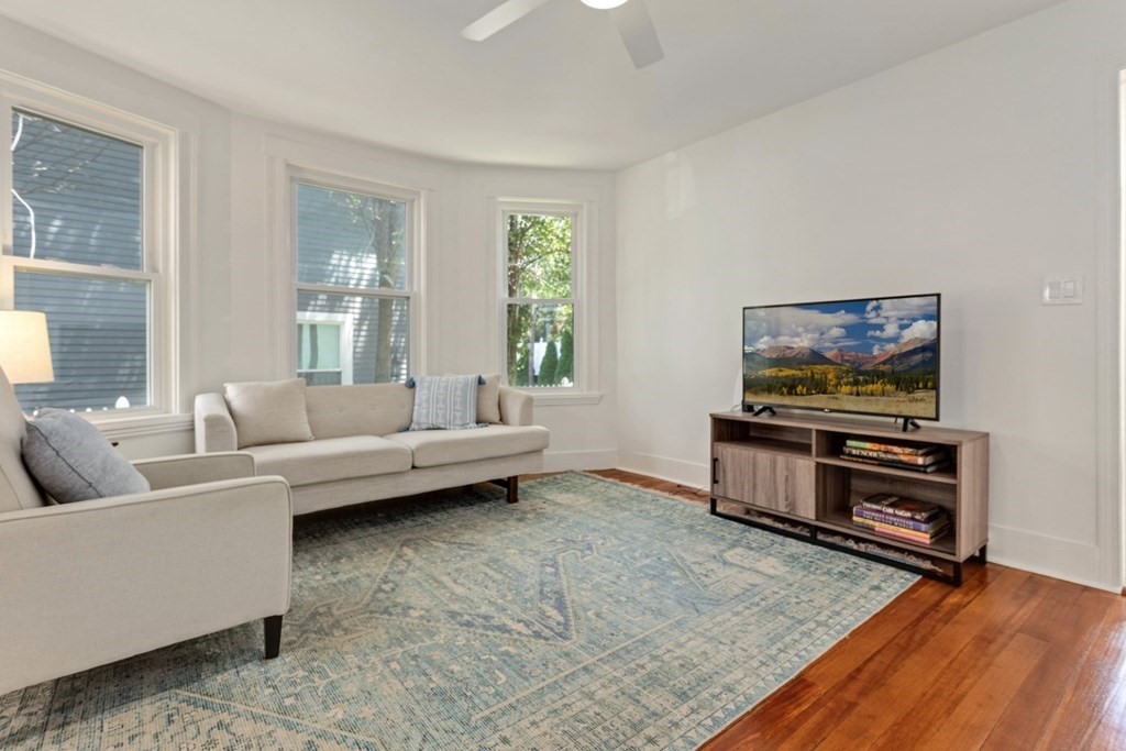 34 Eustis Street Saugus, MA 01906 - Photo 7 of 28 a living room with furniture and a flat screen tv