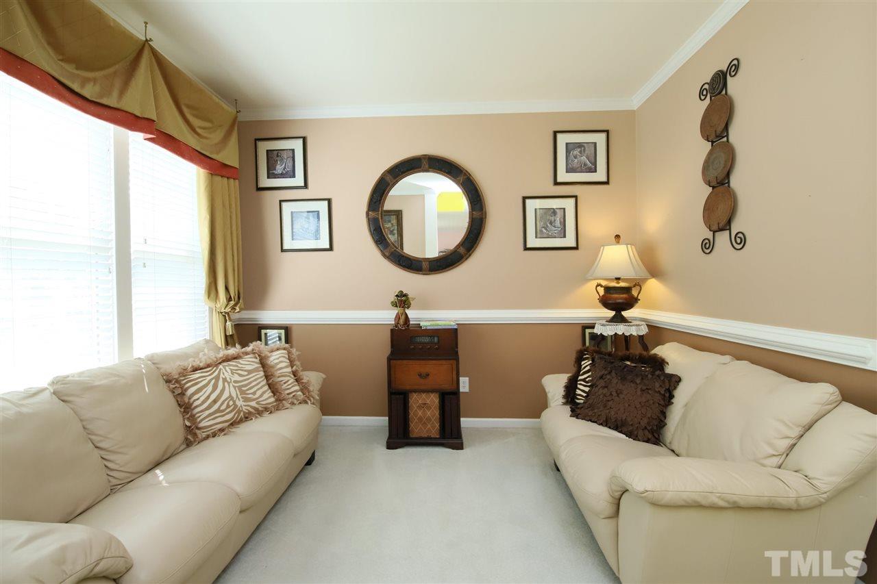 5013 Amberfield Way Raleigh, NC 27604 - Photo 6 of 30 Entertain guest, or quietly read a book and relax.