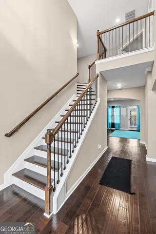 a view of entryway with wooden floor