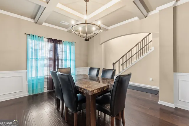 a view of entryway with wooden floor