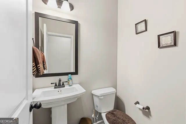 a living room with furniture fireplace and a flat screen tv