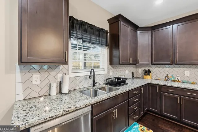 a view of a hallway with closet area