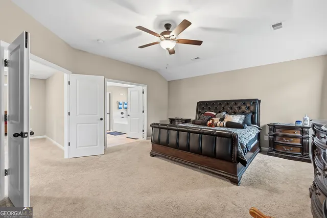 a bathroom with a double vanity sink mirror and next