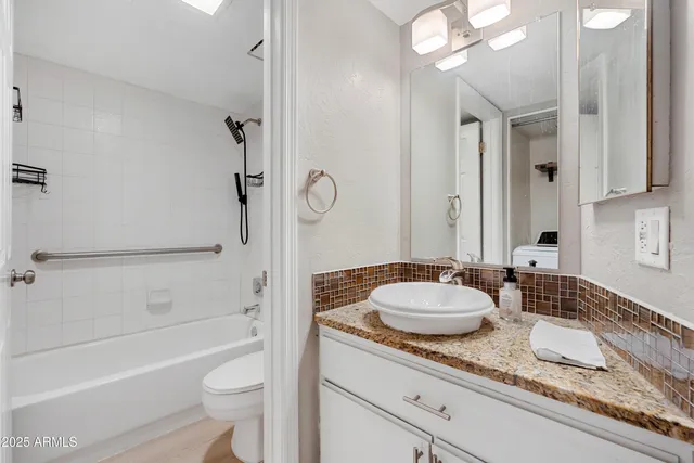 a view of a swimming pool with chairs