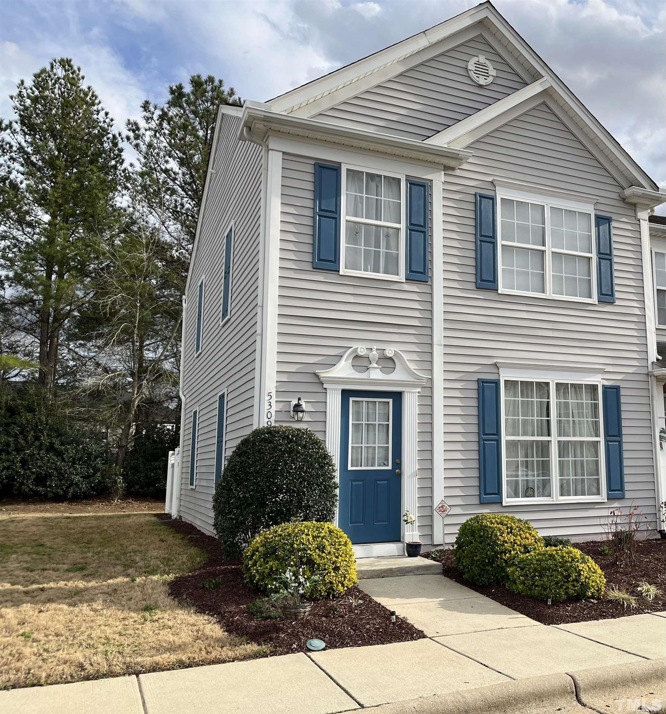5309 Glen Canyon Road Raleigh, NC 27616 - Photo 1 of 11 a front view of a house with garden