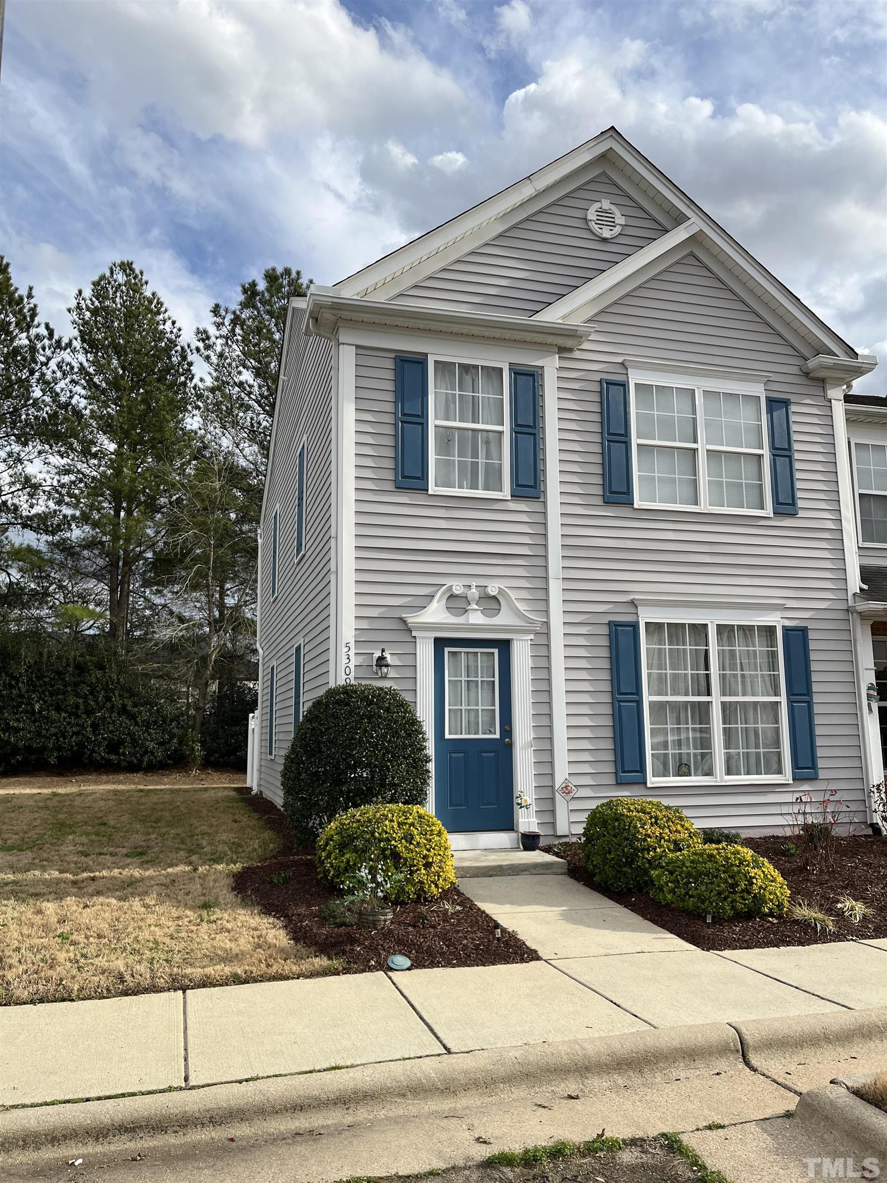 5309 Glen Canyon Road Raleigh, NC 27616 - Photo 2 of 11 a front view of a house with a yard
