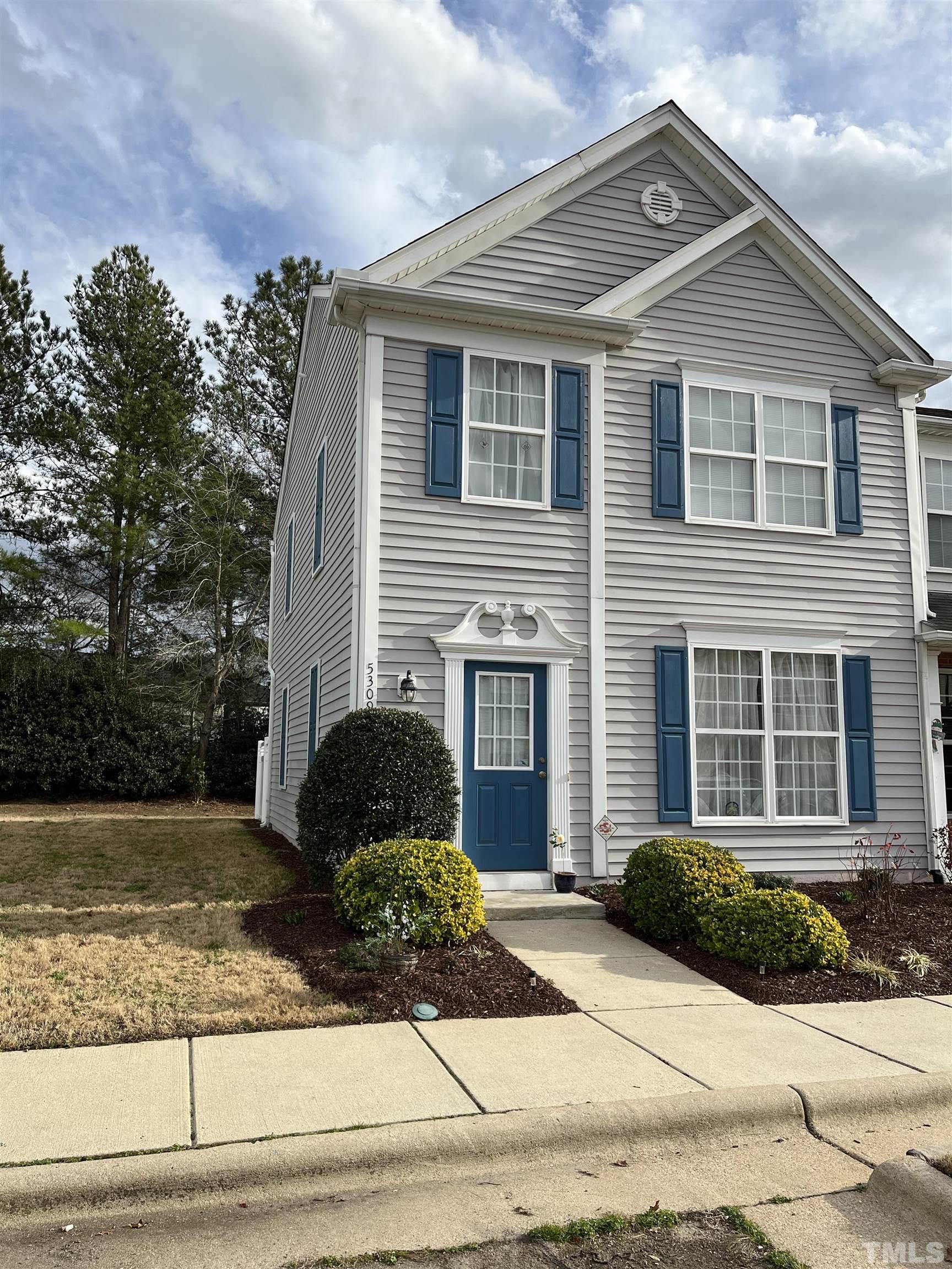 5309 Glen Canyon Road Raleigh, NC 27616 - Photo 3 of 11 a front view of a house with a yard