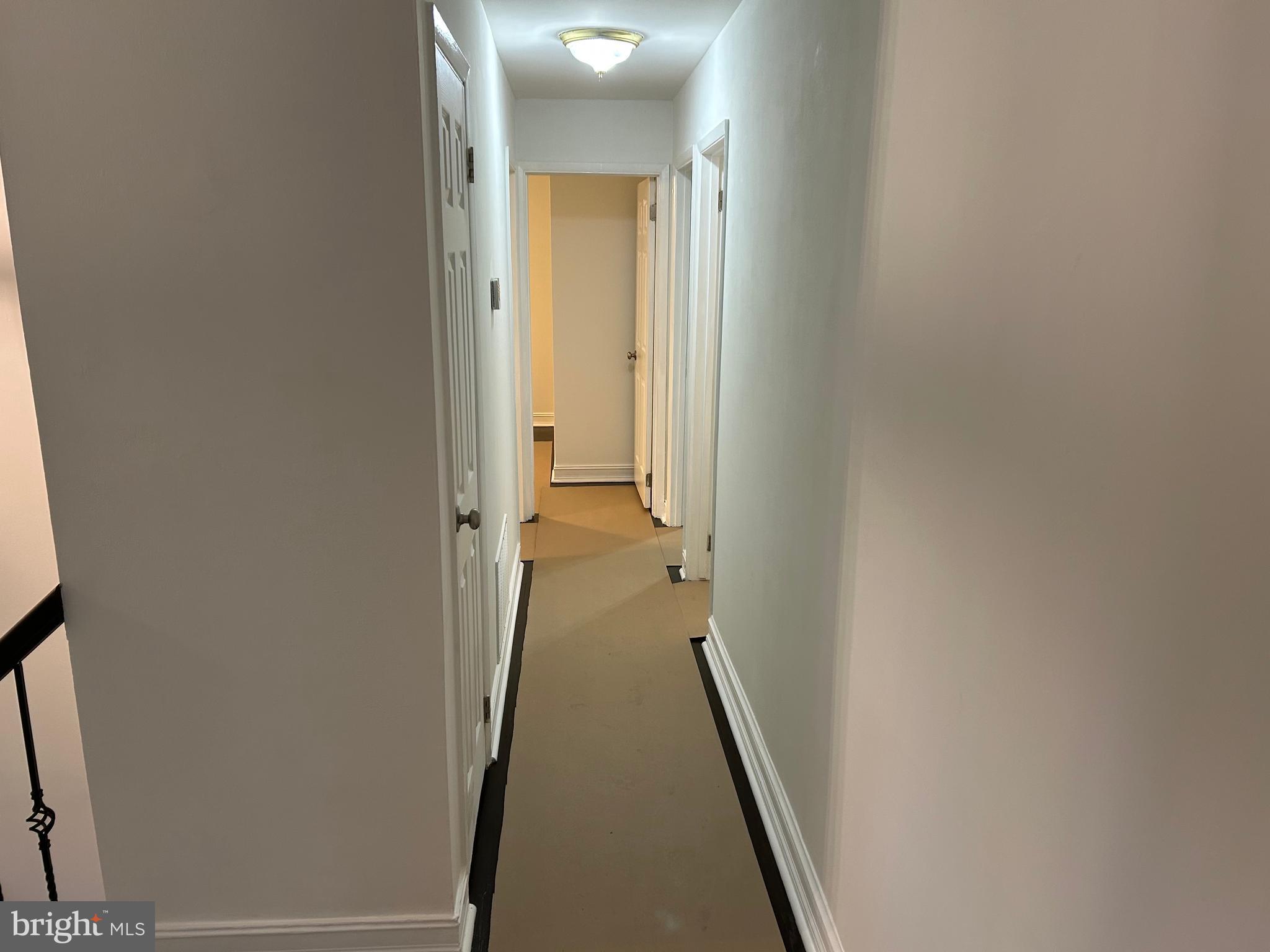 1350 Ritchie Highway Arnold, MD 21012 - Photo 16 of 30 a view of a hallway with wooden floor